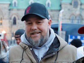 Pat King posed for photos in front of Parliament Hill as truckers and their supporters continued to protest against coronavirus disease (COVID-19) vaccine mandates on Feb. 16, 2022.