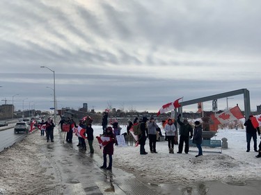 Protestors at Booth and Sir John A Macdonald Parkway on Monday Feb. 21, 2022.  Credit: Bruce Deachman, Postmedia