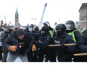 Police from Ottawa and several other forces moved in on the Wellington Street protesters after the Emergencies Act was invoked.