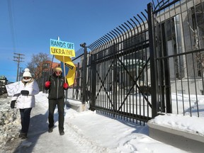 Ukraine supporters rally in front of the Russian Embassy in Ottawa on Thursday.