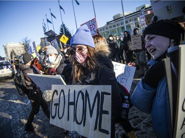 OTTAWA -- Thousands gathered in the downtown core for a protest in connection with the Freedom Convoy that made their way from various locations across Canada and landed in Ottawa, Saturday, Feb. 5, 2022. A counter protest took place on the front lawn of City Hall and Convoy protestors faced off from Confederation Park.