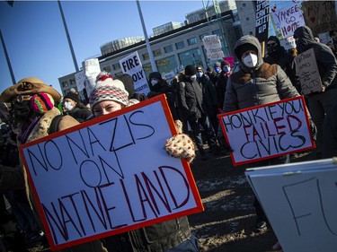 OTTAWA -- Thousands gathered in the downtown core for a protest in connection with the Freedom Convoy that made their way from various locations across Canada and landed in Ottawa, Saturday, Feb. 5, 2022. A counter protest took place on the front lawn of City Hall and Convoy protestors faced off from Confederation Park.