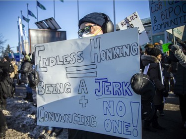 OTTAWA -- Thousands gathered in the downtown core for a protest in connection with the Freedom Convoy that made their way from various locations across Canada and landed in Ottawa, Saturday, Feb. 5, 2022. A counter protest took place on the front lawn of City Hall and Convoy protestors faced off from Confederation Park.