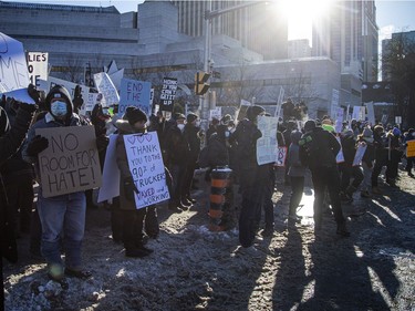 OTTAWA -- Thousands gathered in the downtown core for a protest in connection with the Freedom Convoy that made their way from various locations across Canada and landed in Ottawa, Saturday, Feb. 5, 2022. A counter protest took place on the front lawn of City Hall and Convoy protestors faced off from Confederation Park.
