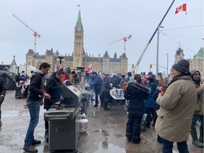 The "Freedom Convoy" protest against COVID-19 mandates continued in downtown Ottawa in front of Parliament Hill Wednesday.