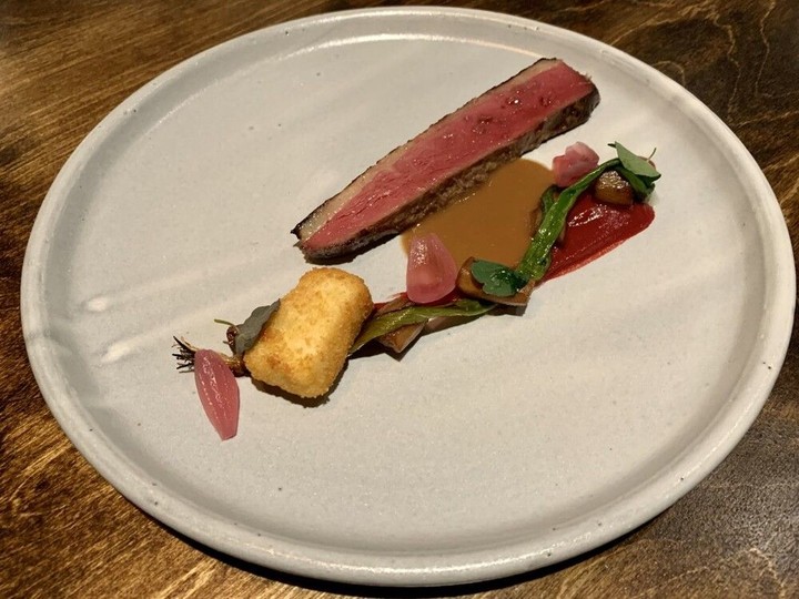  Koji-aged and seaweed-wrapped roasted duck breast, with red wine sauce, caramelized beets, sauerkraut croquette, confit salsify, charred scallion and pickled pearl onion was the final savoury course of a 2022 tasting-menu dinner served at Perch.