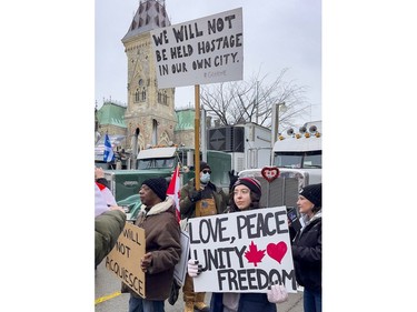A man against the ongoing protests in Ottawa on Wednesday, Feb. 2, 2022.