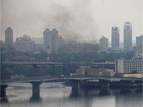 Smoke rises from the territory of the Ukrainian Defence Ministry's unit, after Russian President Vladimir Putin authorized a military operation in eastern Ukraine, in Kyiv,on Feb. 24, 2022.