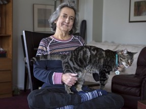 Sheila Young has end stage liver failure and is hoping to find a living donor who could save her life. Sheila with her cat Benji at home. Thursday, Mar. 17, 2022.