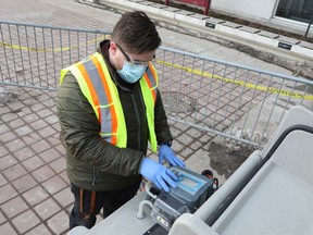File: Patrick D'Aoust, technical officer at uOttawa collects samples for COVID-19 wastewater studies at University of Ottawa.

Assignment 137297

Photo by Jean Levac/Postmedia