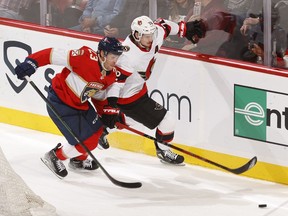 FILES: Carter Verhaeghe (23) of the Florida Panthers and Thomas Chabot (72) of the Ottawa Senators chase the puck in the second period at FLA Live Arena on March 3, 2022 in Sunrise, Florida.