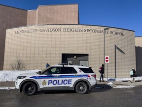 OTTAWA -- An Ottawa Police Service vehicle at Longfields-Davidson Heights Secondary School in Barrhaven. Tuesday, Mar. 8, 2022 -- . ERROL MCGIHON, Postmedia