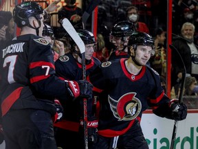 Senators center Josh Norris (9) is congratulated on his goal against the Seattle Kraken during first period NHL action at the Canadian Tire Centre on March 10, 2022.