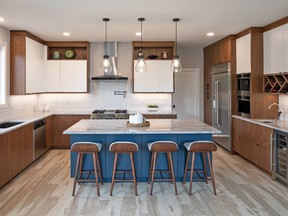 Wood tones and wood grains have a prominent place in kitchen design. Project by AyA Kitchens.
