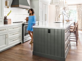 This kitchen features wood flooring.