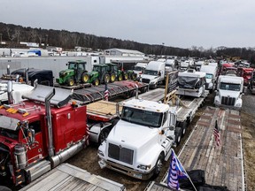 Hundreds of vehicles including 18-wheeler trucks, RVs and other cars are part of a convoy that travelled across the U.S. headed to Washington D.C. to protest coronavirus disease (COVID-19) related mandates and other issues in Hagerstown, Maryland, U.S., March 5, 2022. REUTERS/Stephanie Keith