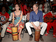 Prince William and Catherine, the Duke and Duchess of Cambridge, play drums during a visit to Trench Town Culture Yard Museum where Bob Marley used to live, during a royal tour of the Caribbean, March 22, 2022 in Kingston, Jamaica.