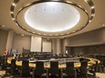 A file photo of Ottawa City Council chambers for a meeting on April 8, 2020, when Mayor Jim Watson was the only member of council in the room, while other councillors participated remotely.