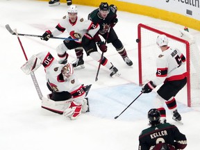 A shot from Arizona Coyotes defenceman Shayne Gostisbehere (not pictured) gets past Ottawa Senators goaltender Matt Murray (30) for a goal during the third period at Gila River Arena.