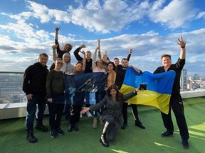 A moment in time: on the eve of the Russian invasion, a shot of employees at the Kyiv office of Overdose., a software specialist based in New Zealand. Photo courtesy of Overdose.