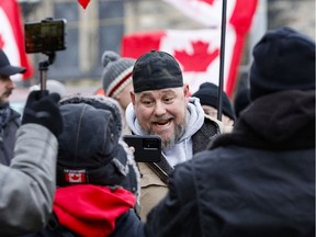 Files:  Anti vaccine mandate protest leader Pat King amongst the crowd in downtown Ottawa on Wednesday, Feb. 16, 2022