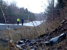 Police investigators were at the scene of the fatal two-vehicle collision that occurred on Eighth Line Road near Metcalfe on Nov. 17, 2013.