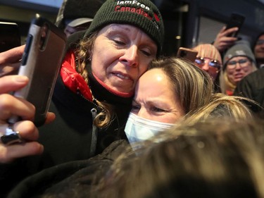 Convoy protest organizer Tamara Lich (wearing a mask) released on bail at the Ottawa court house in Ottawa, Monday.