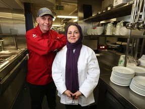 Forough AliKarami, right, seen here with Chef Ric Allen-Watson, is among those in the first graduating class of the catering program the Ottawa Mission runs out of the former Rideau Bakery.