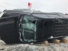 A fire truck came across this overturned vehicle at Blair and Cyrville roads at about 1:51 p.m. Tuesday. Firefighters stablilized the vehicle and extricated the person inside in six minutes.