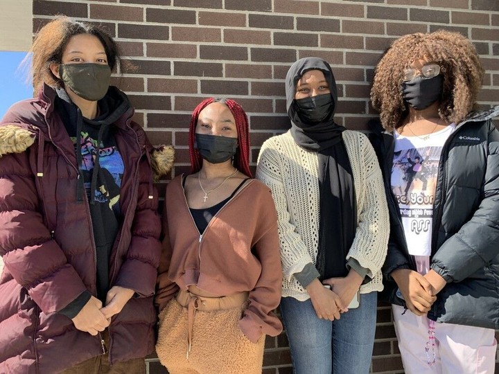  Ottawa, March 21, 2022: Ridgemont High School students, from left, Toni Massey, 19, Emilia Nanzie, 17, Aisha Jama, 17, and Alice Kandolo, 17, all say they will still wear masks at school.