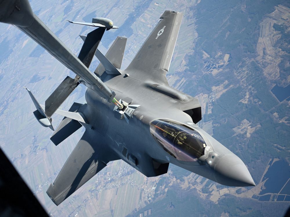 A U.S. Air Force F-35 Lightning II aircraft receives fuel from a KC-10 Extender aircraft over Poland. Canada should immediately announce the decision to acquire F-35 fighter jets. 