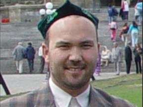 This file shot from May, 2005 shows human rights activist Huseyin Celil in front of the Parliament buildings.