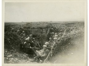 Canadian soldiers in a captured German machine-gun emplacement, Battle of Vimy Ridge, April 1917.  We would do well to remember that we have been through a lot together, and that the issues dividing Canadians today are nothing compared to the blood-letting battles we have faced in the past. (George Metcalf Archival Collection CWM 19920085-917 O.1164)