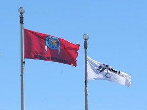 Two Algonquin Anishinabe flags (center) were raised at Ottawa City Hall in 2016.