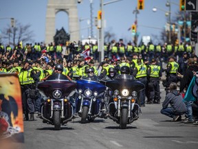 The 'Rolling Thunder' Ottawa motorcycle rally made its way through downtown Ottawa on a controlled route along Elgin Street Saturday, April 30, 2022.