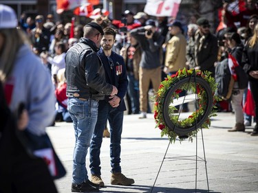 Neil Sheard, the organizer of the 'Rolling Thunder' Ottawa rally and Christopher Deering spoke during a ceremony at the National War Memorial.