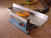 This is the kind of small, inexpensive benchtop jointer that makes it easy to refine parts for better small and medium-sized woodworking projects.
