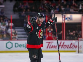 Austin Watson #16 of the Ottawa Senators celebrates Dylan Gambrell #27 (not shown) second period goal against the Toronto Maple Leafs at Canadian Tire Centre on April 16, 2022 in Ottawa, Ontario.