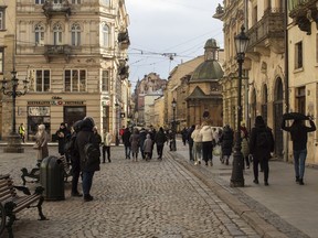 LVIV, UKRAINE - March 2022 - Cafés and restaurants remain full in Lviv. One volunteer interviewed speculated that Ukraine's pandemic experiences contributed to this – as the pandemic had taught them that, even in times of disaster, life must go on if businesses are to survive. Adam Zivo