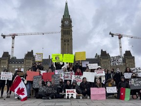 Students from Smiths Falls and District Collegiate Institute protest on Parliament Hill in support of girls in Afghanistan who have been not been allowed to return to school by the Taliban.