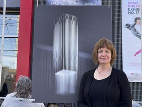 Second-year diploma student Ann Piché with one of her works of art outside of the School of the Photographic Arts: Ottawa.