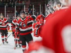 FILES: Ottawa 67's forward Alex Johnston (21) celebrates his team's fifth goal on its way to a 9-4 win against the Peterborough Petes in an Ontario Hockey League game at TD Place arena on Friday, March, 25, 2022.