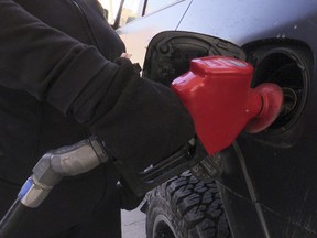 Gasoline prices are expected to rise by 12 cents Saturday, to 185.9 cents a litre. Jack Boland/Toronto Sun/Postmedia Network