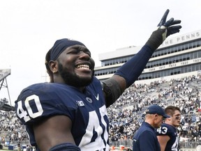 Penn State linebacker Jesse Luketa celebrates after his team's victory over Villanova on Sept. 25, 2021.