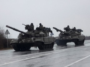 Tanks move into Mariupol, Ukraine, after Russian President Vladimir Putin authorized a military operation, on Feb. 24, 2022.
