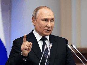 Russian President Vladimir Putin speaks at the Russian parliament in St. Petersburg on April 27, 2022.