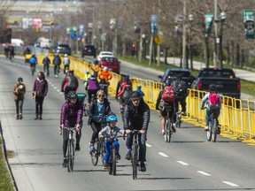 Cyclist, joggers and pedestrians make their way along a closed-off Lake Shore Boulevard in Toronto in spring, 2021. There are advantages and disadvantages to closing streets, says one reader.