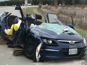 The trapped occupant was safely extricated from this vehicle after it rolled over on West Hunt Club Road.