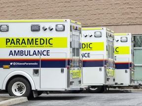 Three ambulances parked at the Montfort Hospital on Wednesday.