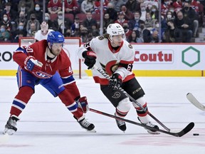 Files: Montreal Canadiens forward Joel Armia (40) takes the puck away from Ottawa Senators forward Tyler Ennis (63) during the third period at the Bell Centre., March 19, 2022.